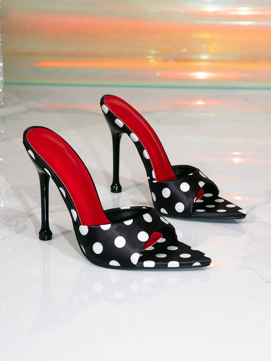 Women's pointed toe high heel mule sandals featuring stiletto heels and decorative accents for party wear.