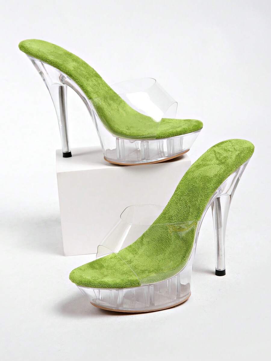 Transparent chunky heel platform slide sandals for women featuring clear PVC upper, open toe design, and ultra high heels.