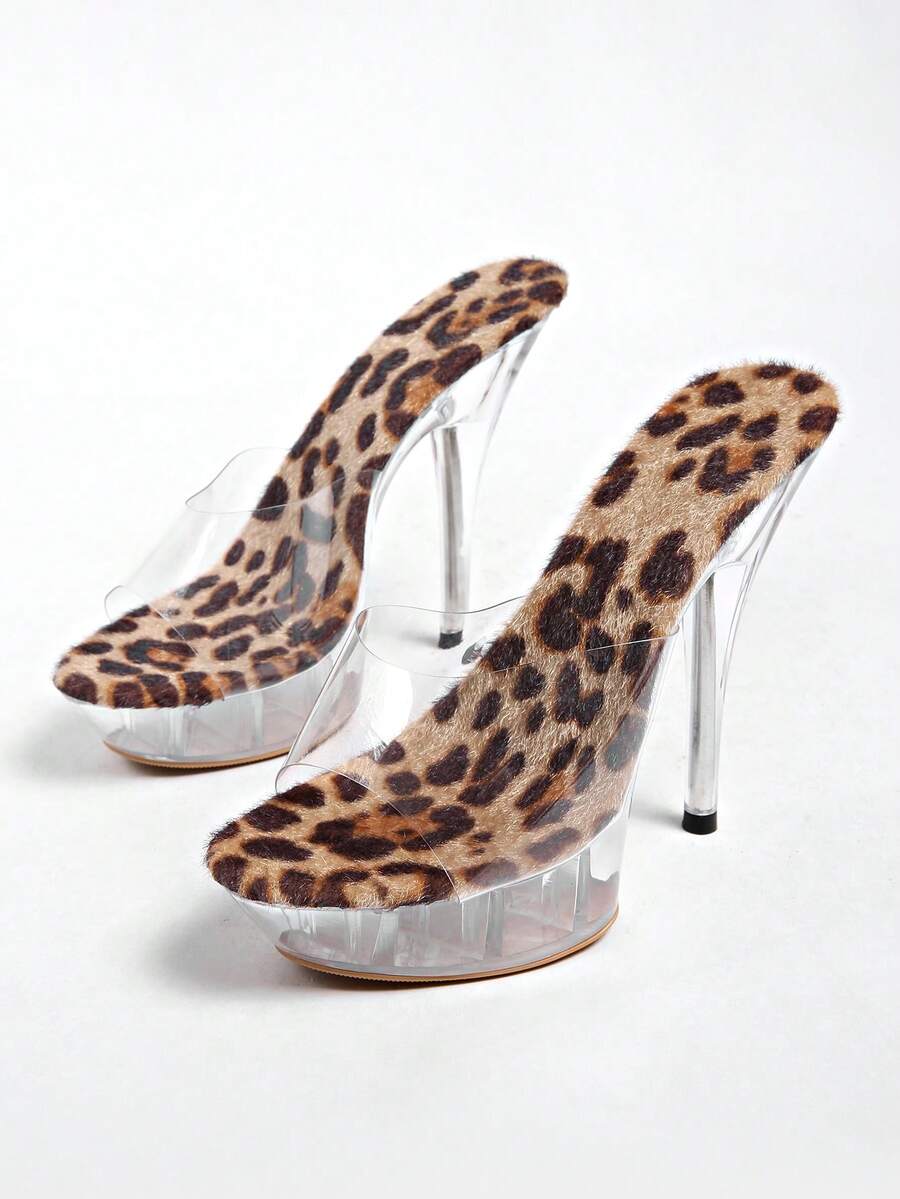 Transparent chunky heel platform slide sandals for women featuring clear PVC upper, open toe design, and ultra high heels.