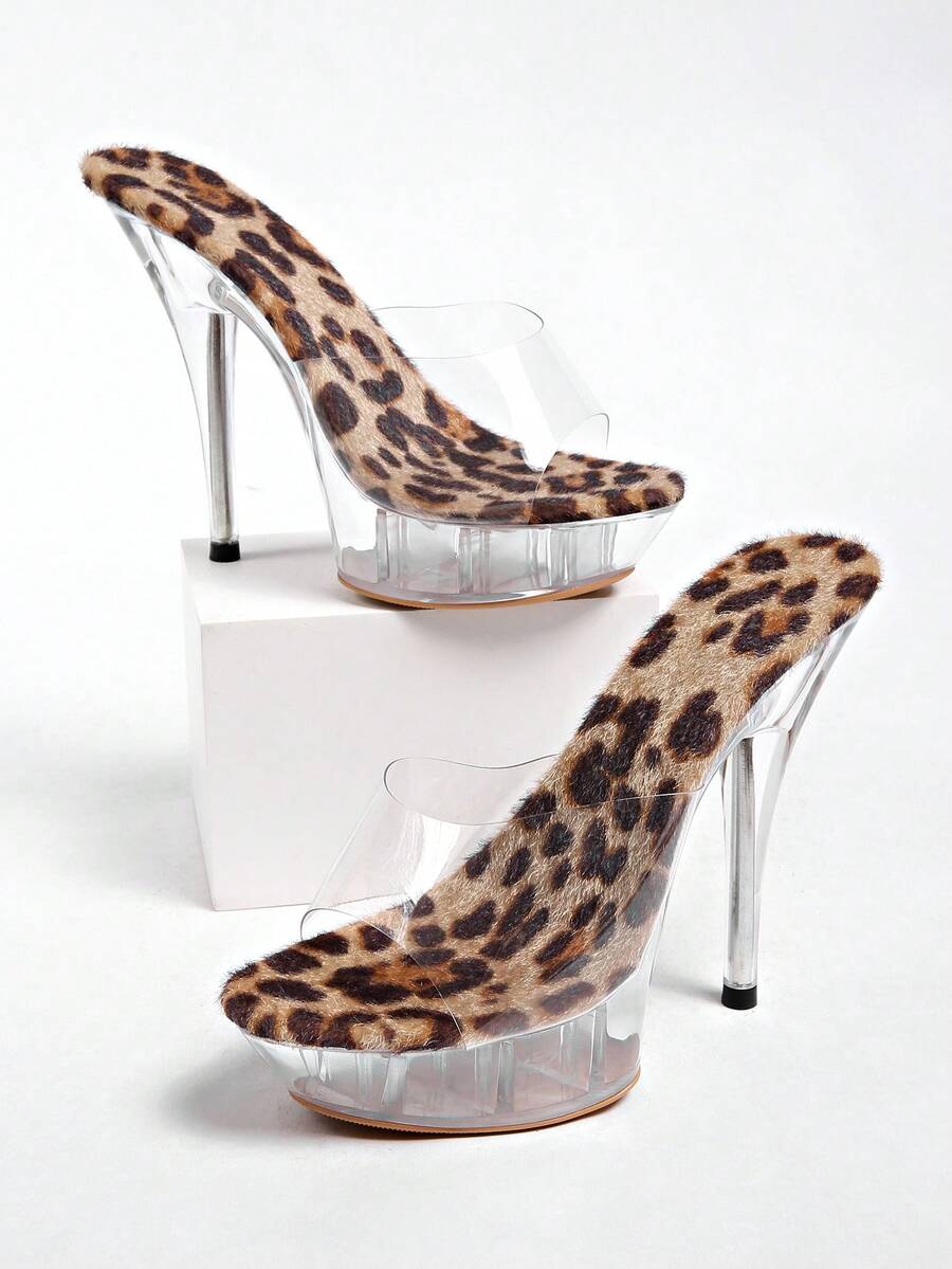 Transparent chunky heel platform slide sandals for women featuring clear PVC upper, open toe design, and ultra high heels.