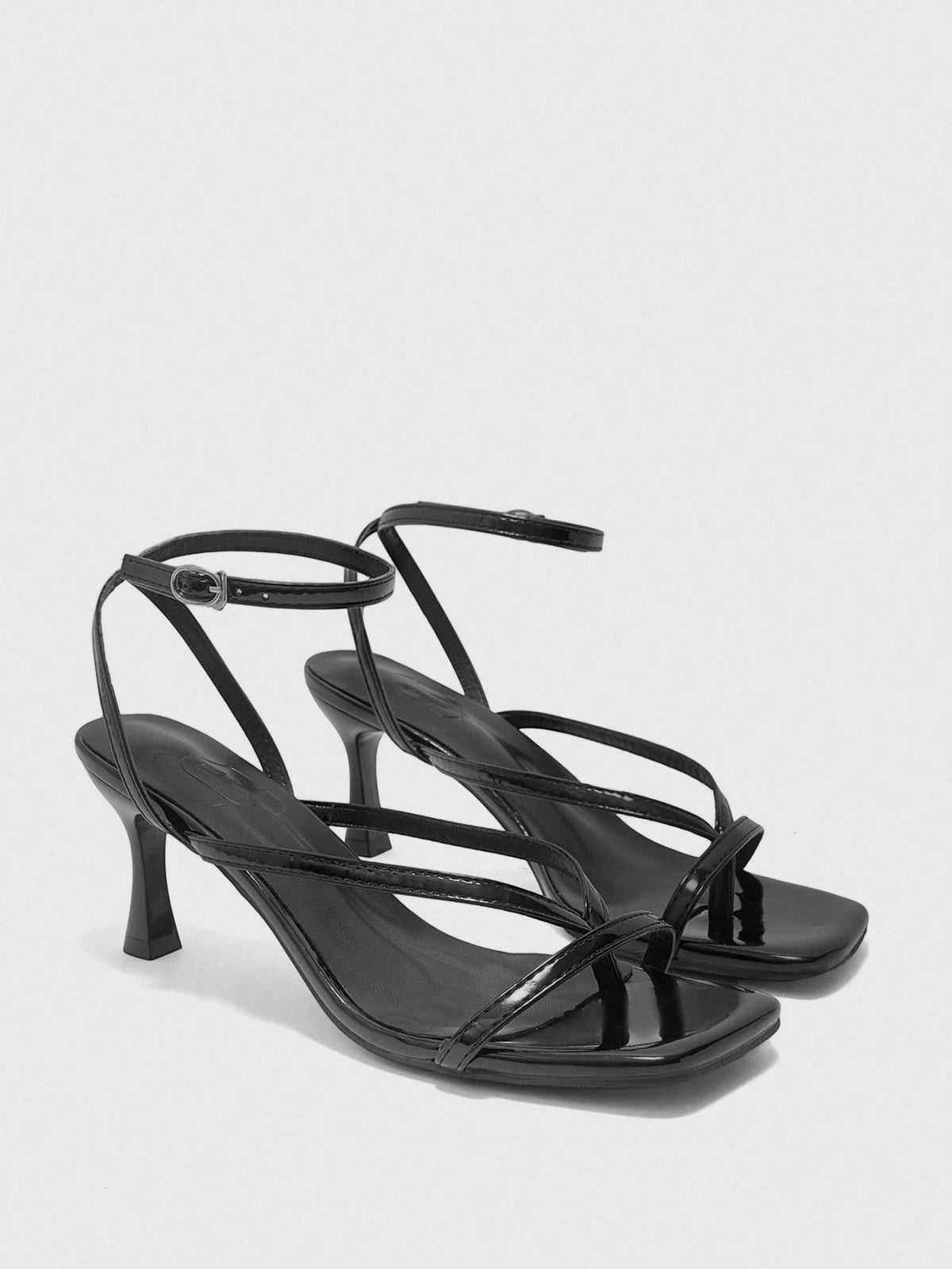 Burgundy women's thin strap thong sandals with ankle strap and kitten heels.