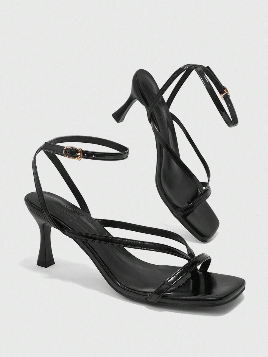 Burgundy women's thin strap thong sandals with ankle strap and kitten heels.