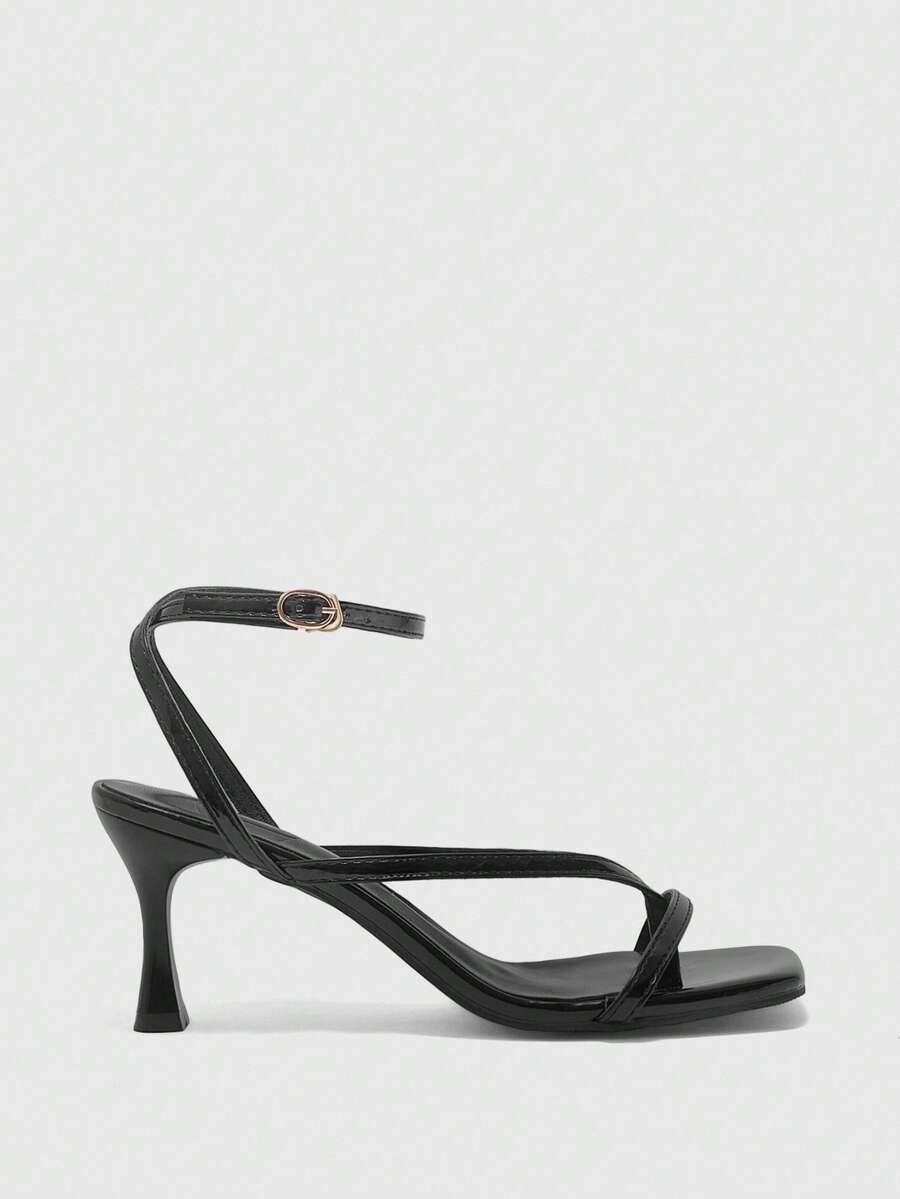 Burgundy women's thin strap thong sandals with ankle strap and kitten heels.