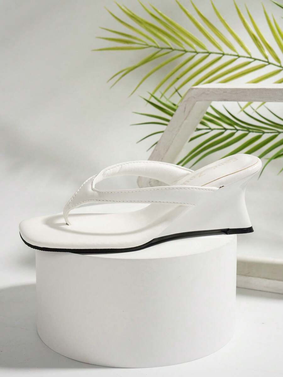 Women's square toe wedge flip-flops with sleek PU leather toe-post straps and elevated wedge heels.
