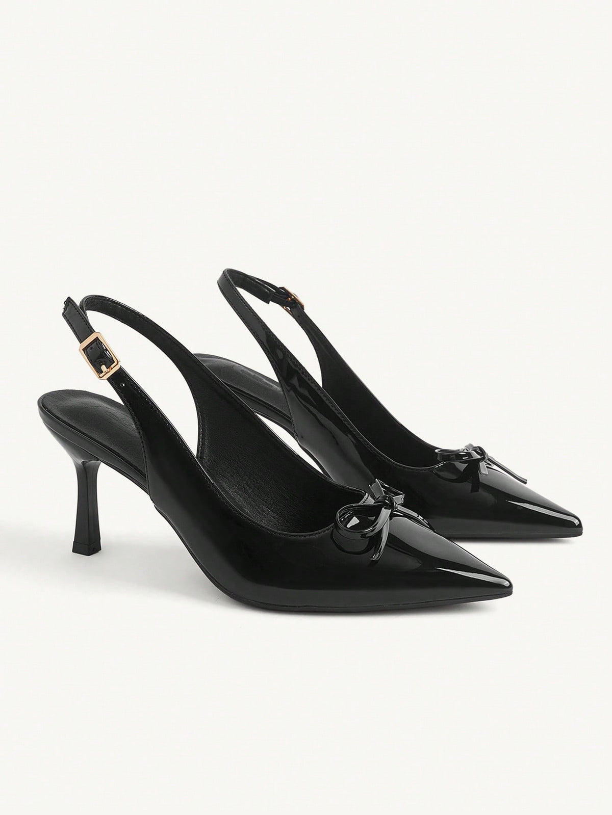 Beige pointed toe high heel pumps featuring a sleek stiletto heel and slingback strap for women.