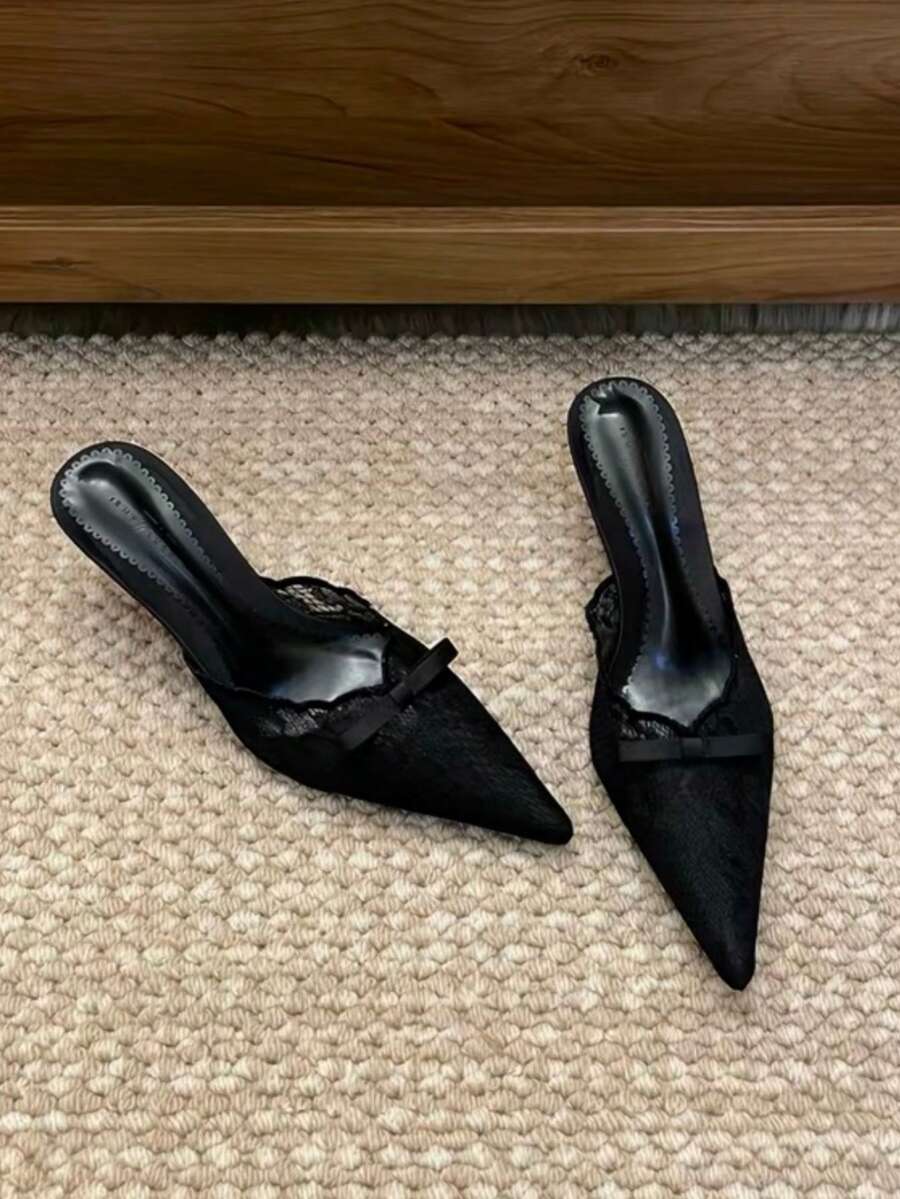Lace pointed toe stiletto heel sandal pumps featuring mesh detailing, high slender heels, and an adjustable ankle buckle strap.