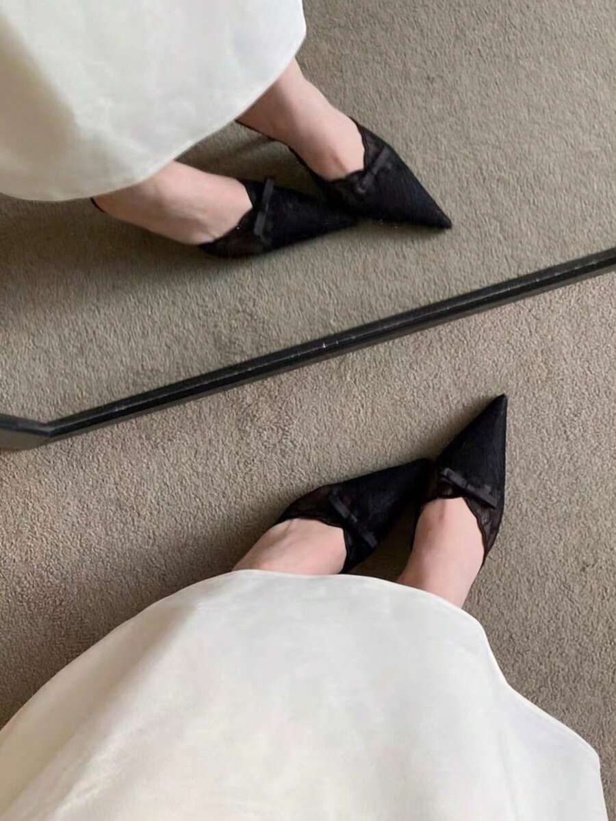 Lace pointed toe stiletto heel sandal pumps featuring mesh detailing, high slender heels, and an adjustable ankle buckle strap.