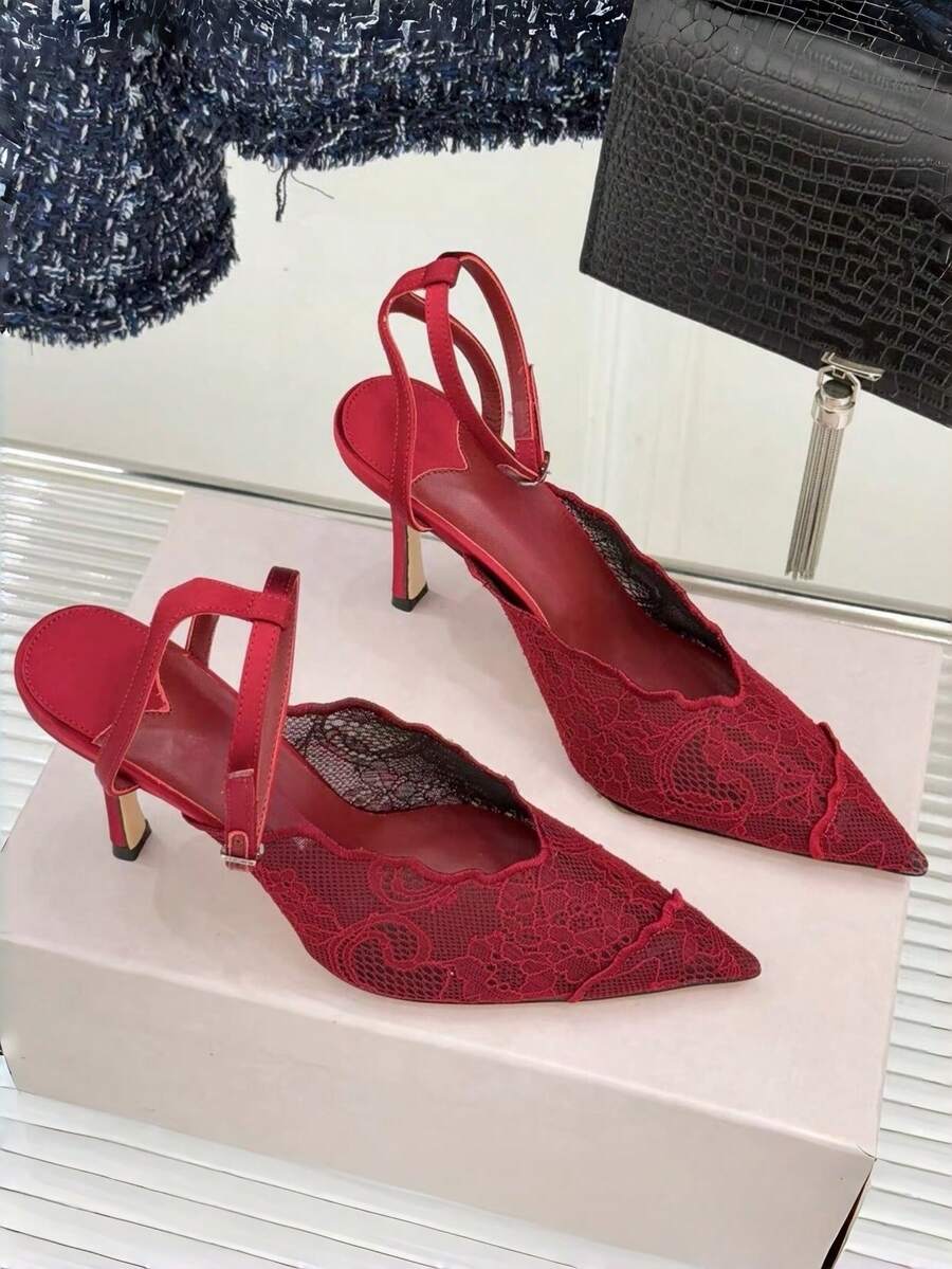 Lace pointed toe stiletto heel sandal pumps featuring mesh detailing, high slender heels, and an adjustable ankle buckle strap.