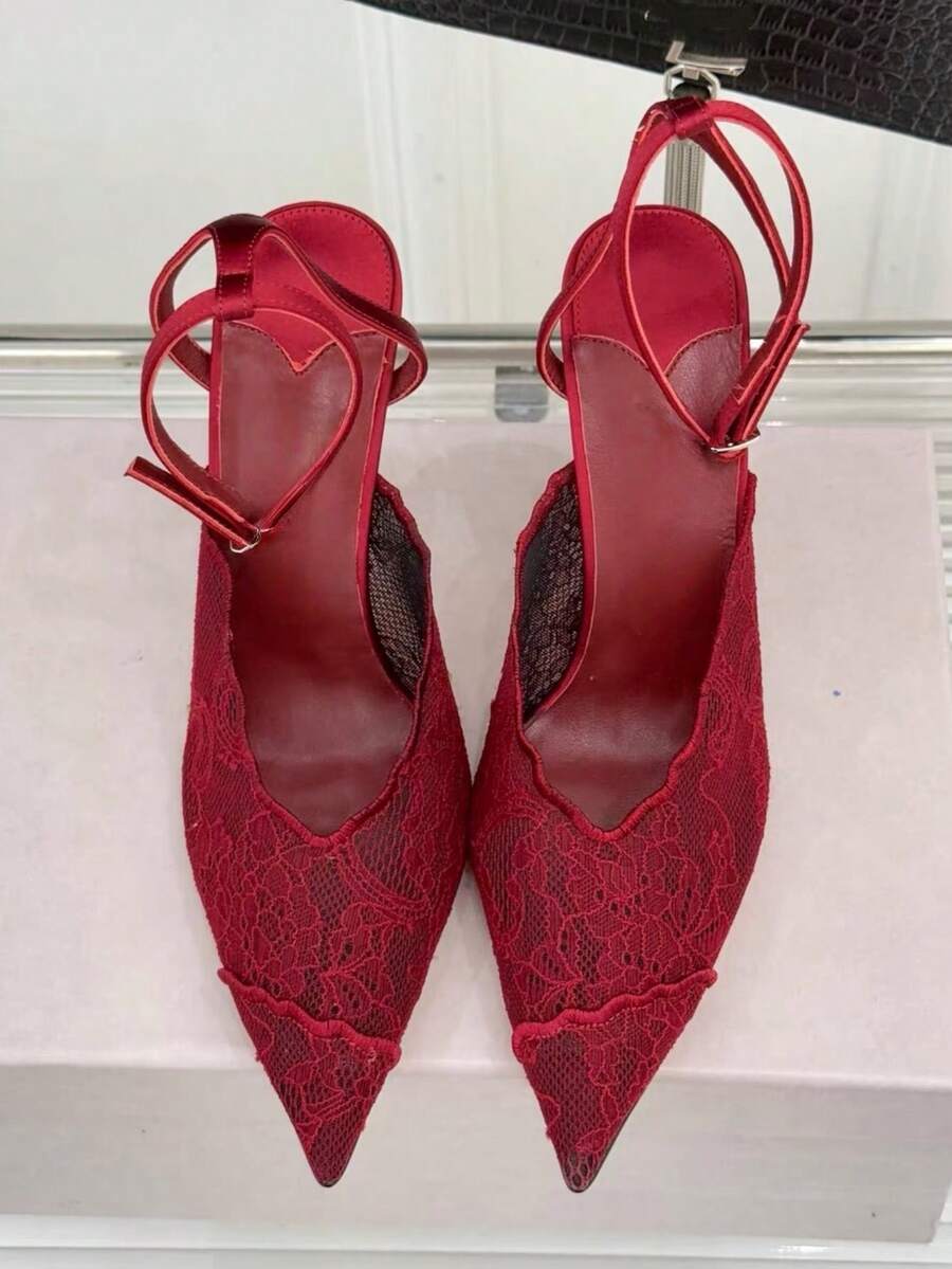 Lace pointed toe stiletto heel sandal pumps featuring mesh detailing, high slender heels, and an adjustable ankle buckle strap.