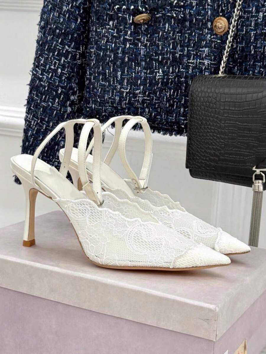Lace pointed toe stiletto heel sandal pumps featuring mesh detailing, high slender heels, and an adjustable ankle buckle strap.
