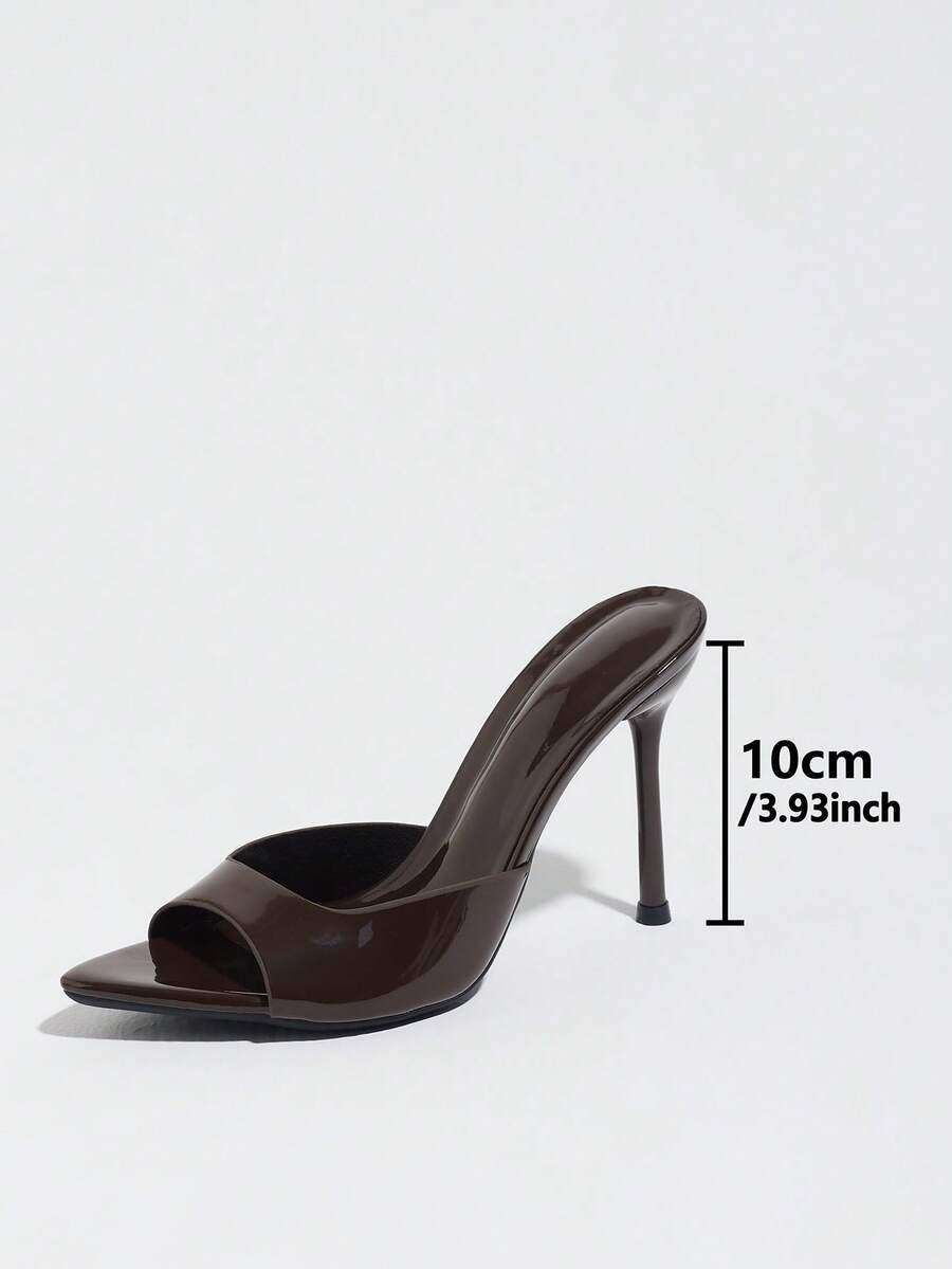 Women's coffee brown high heel mule shoes featuring a glossy mirror finish, open toe design, and sleek stiletto heel.
