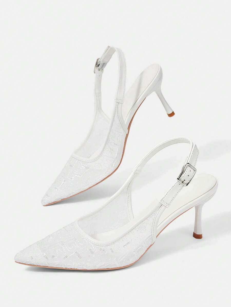 Pointed toe stiletto high heel pumps featuring black lace mesh upper, buckle slingback detail, and sleek slip-on design for weddings and evening wear.