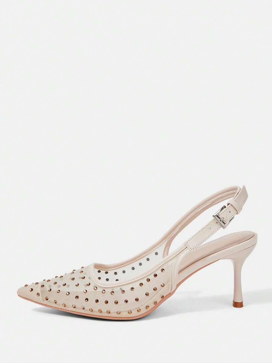 Pointed toe stiletto high heel pumps featuring black lace mesh upper, buckle slingback detail, and sleek slip-on design for weddings and evening wear.