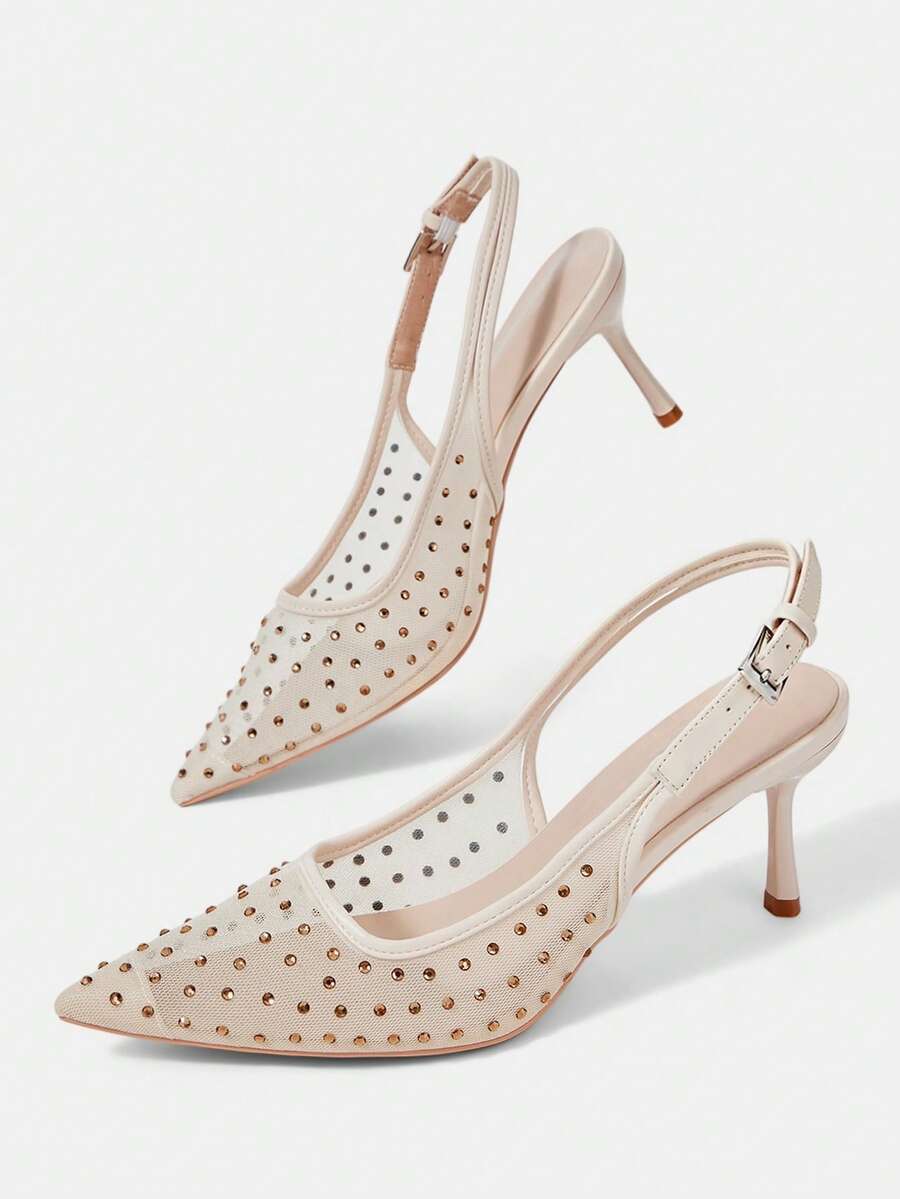 Pointed toe stiletto high heel pumps featuring black lace mesh upper, buckle slingback detail, and sleek slip-on design for weddings and evening wear.