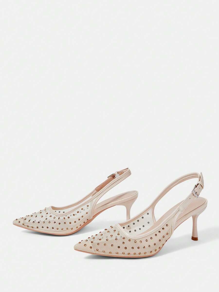 Pointed toe stiletto high heel pumps featuring black lace mesh upper, buckle slingback detail, and sleek slip-on design for weddings and evening wear.