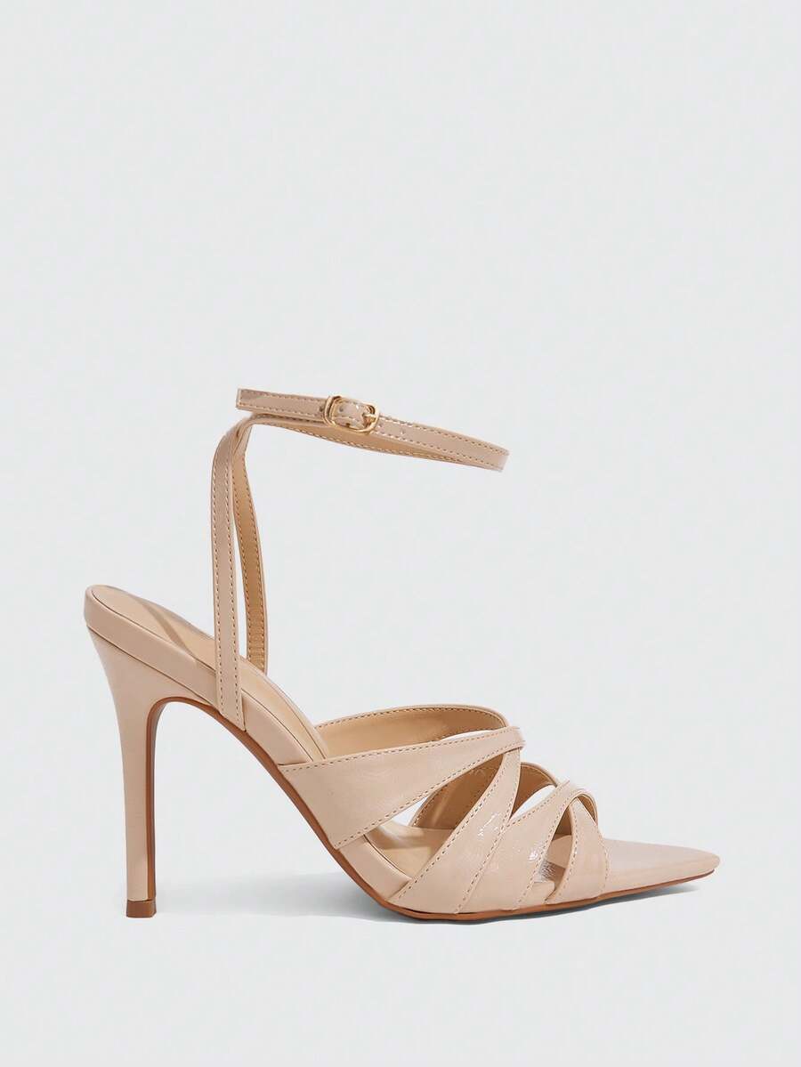Women's open toe high stiletto sandals with cut-out cross straps and adjustable ankle buckle closure.