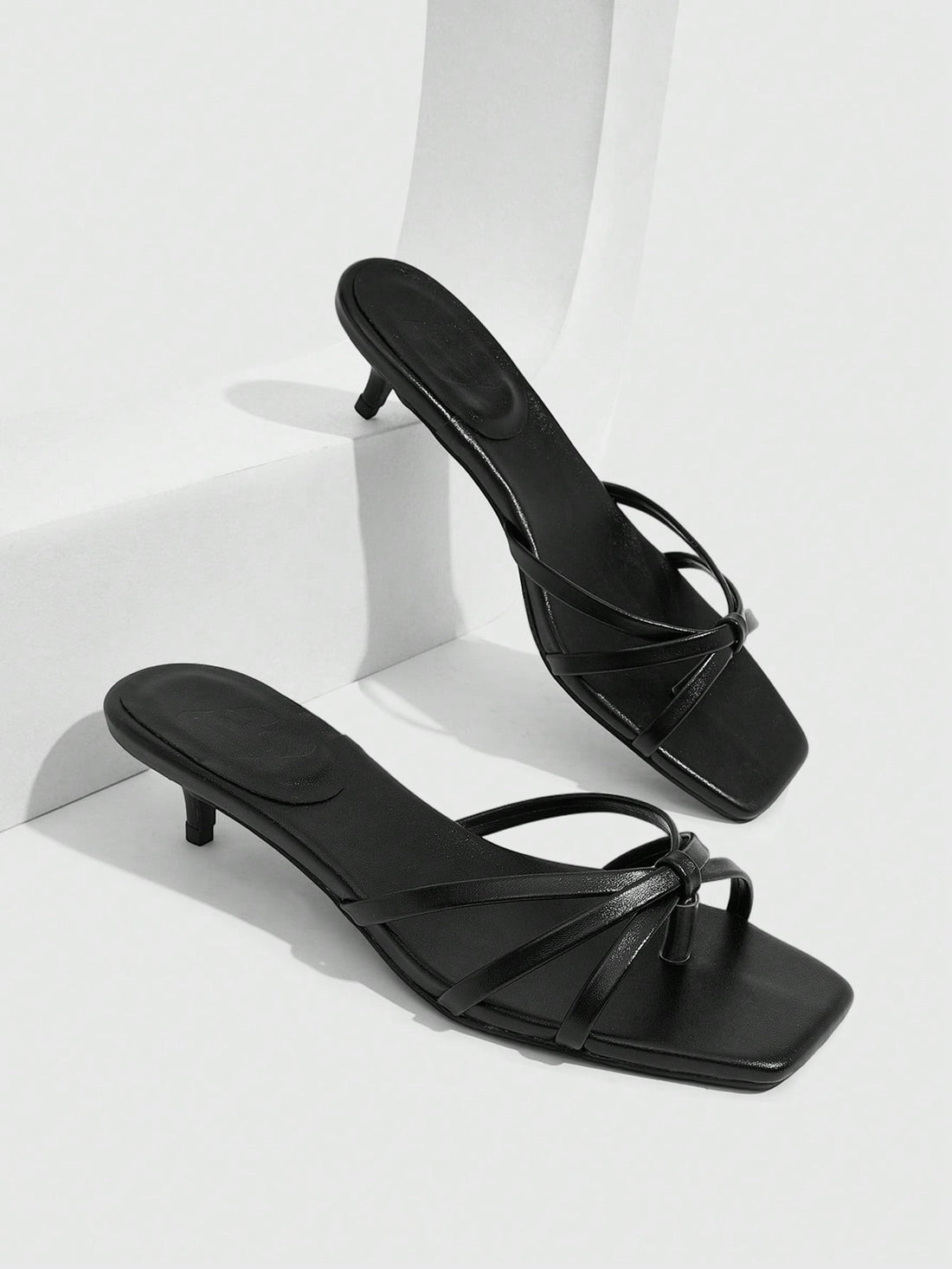 Square toe gold metallic heel sandals for women featuring open toe, crossover slingback strap, and stiletto mid heel for weddings and parties.
