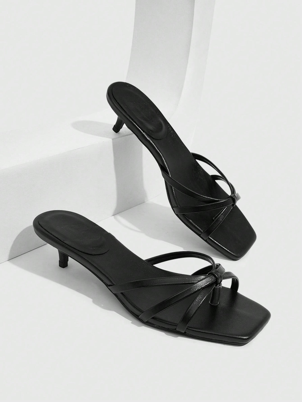 Square toe gold metallic heel sandals for women featuring open toe, crossover slingback strap, and stiletto mid heel for weddings and parties.