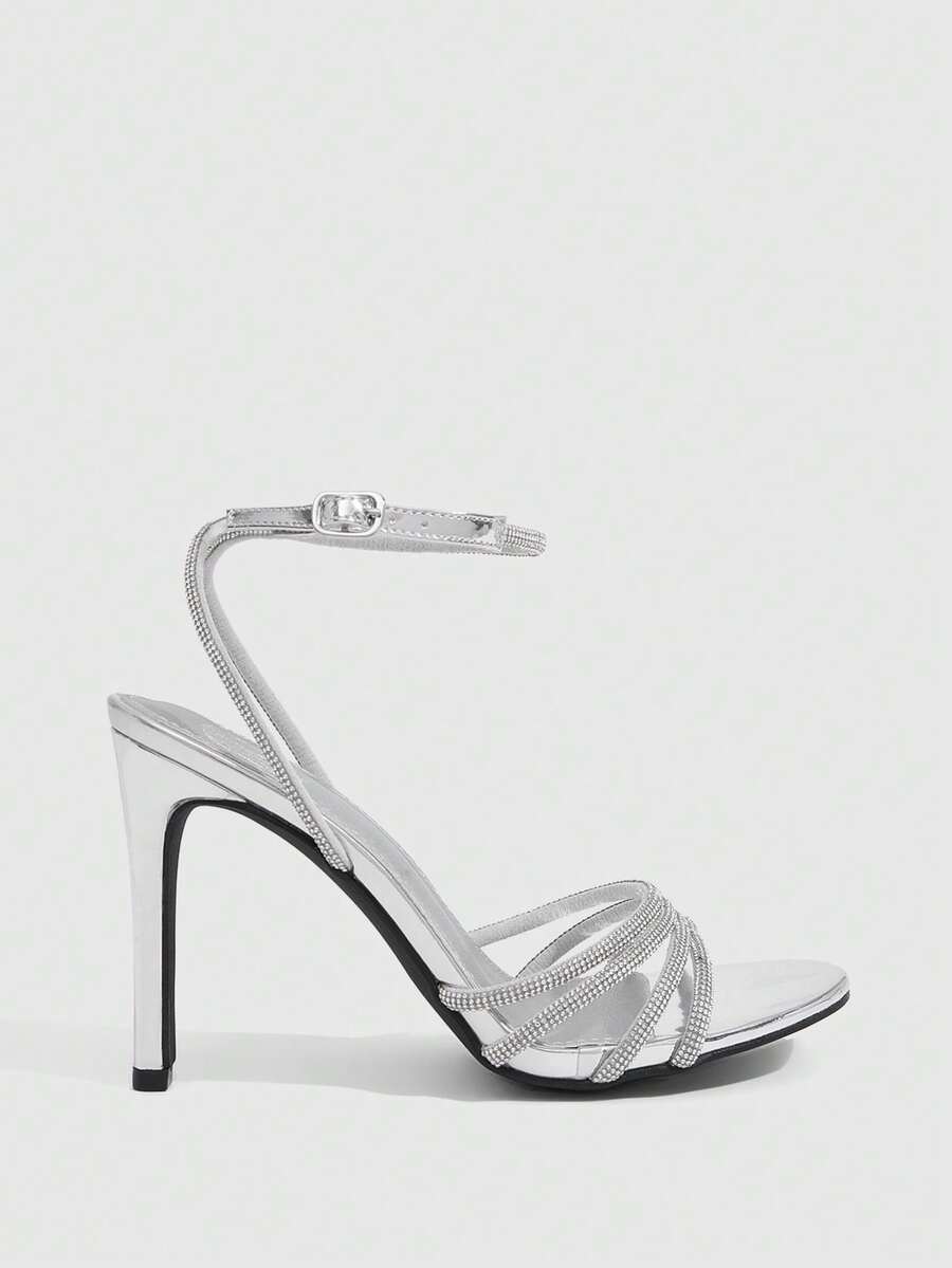 Silver rhinestone stiletto high heel sandals with open toe and adjustable ankle strap buckle