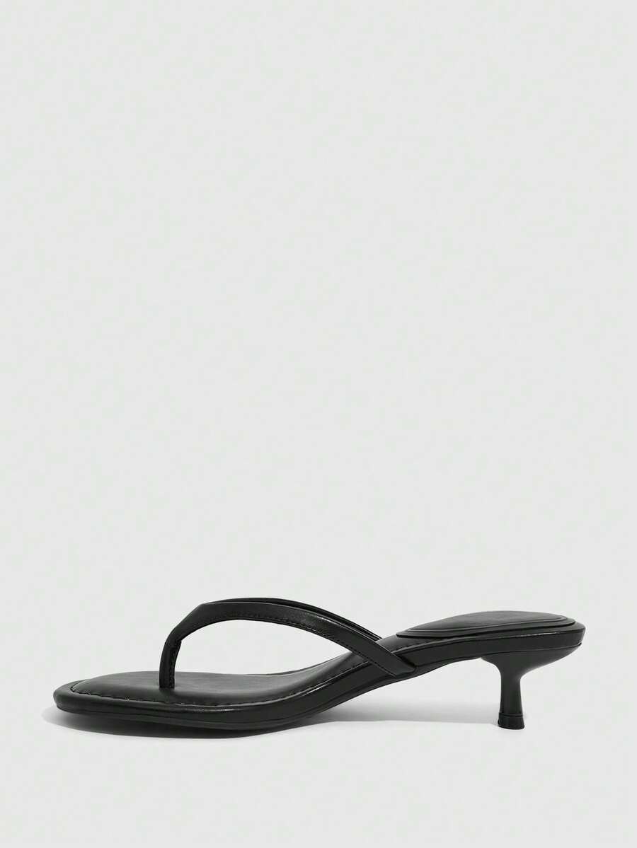 Women's kitten heel flip flop sandals featuring sleek PU leather straps, open toe, and low kitten heel.