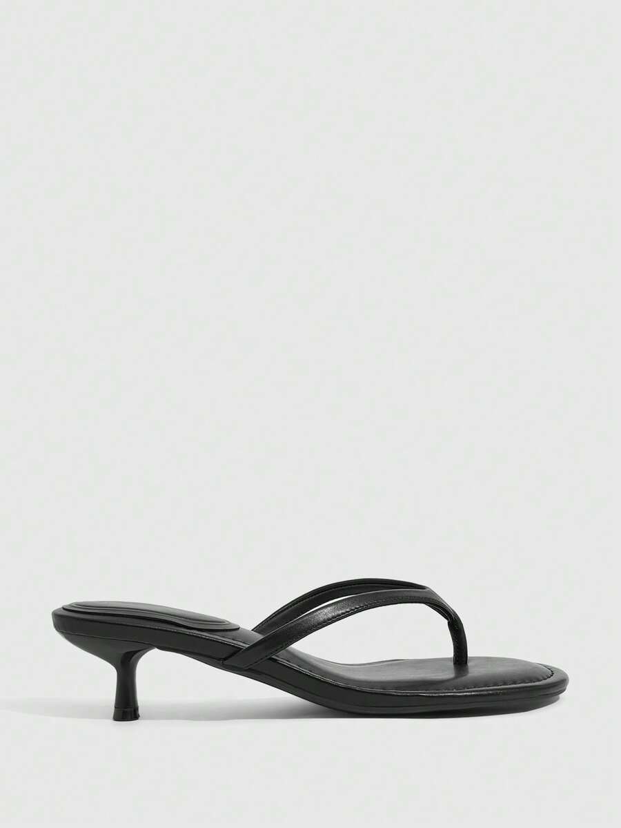 Women's kitten heel flip flop sandals featuring sleek PU leather straps, open toe, and low kitten heel.