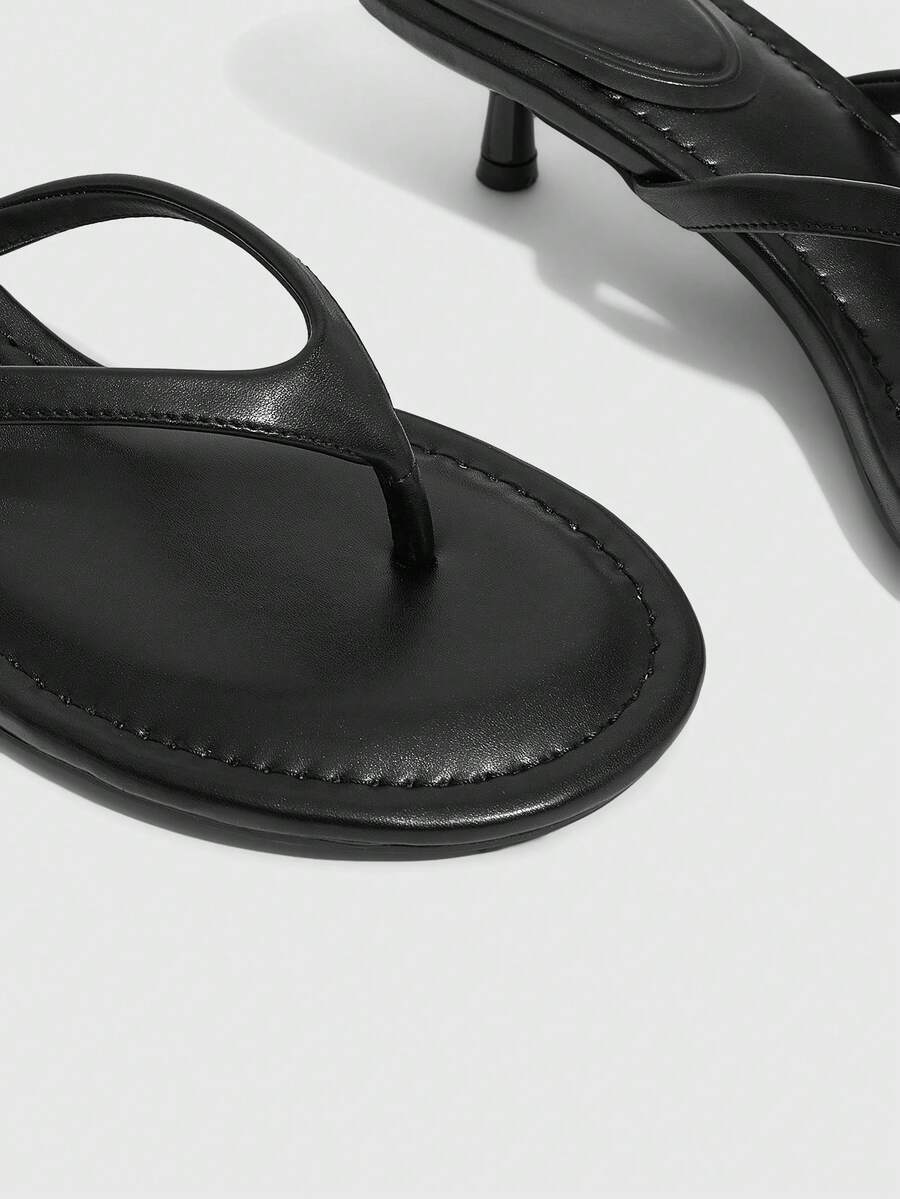 Women's kitten heel flip flop sandals featuring sleek PU leather straps, open toe, and low kitten heel.
