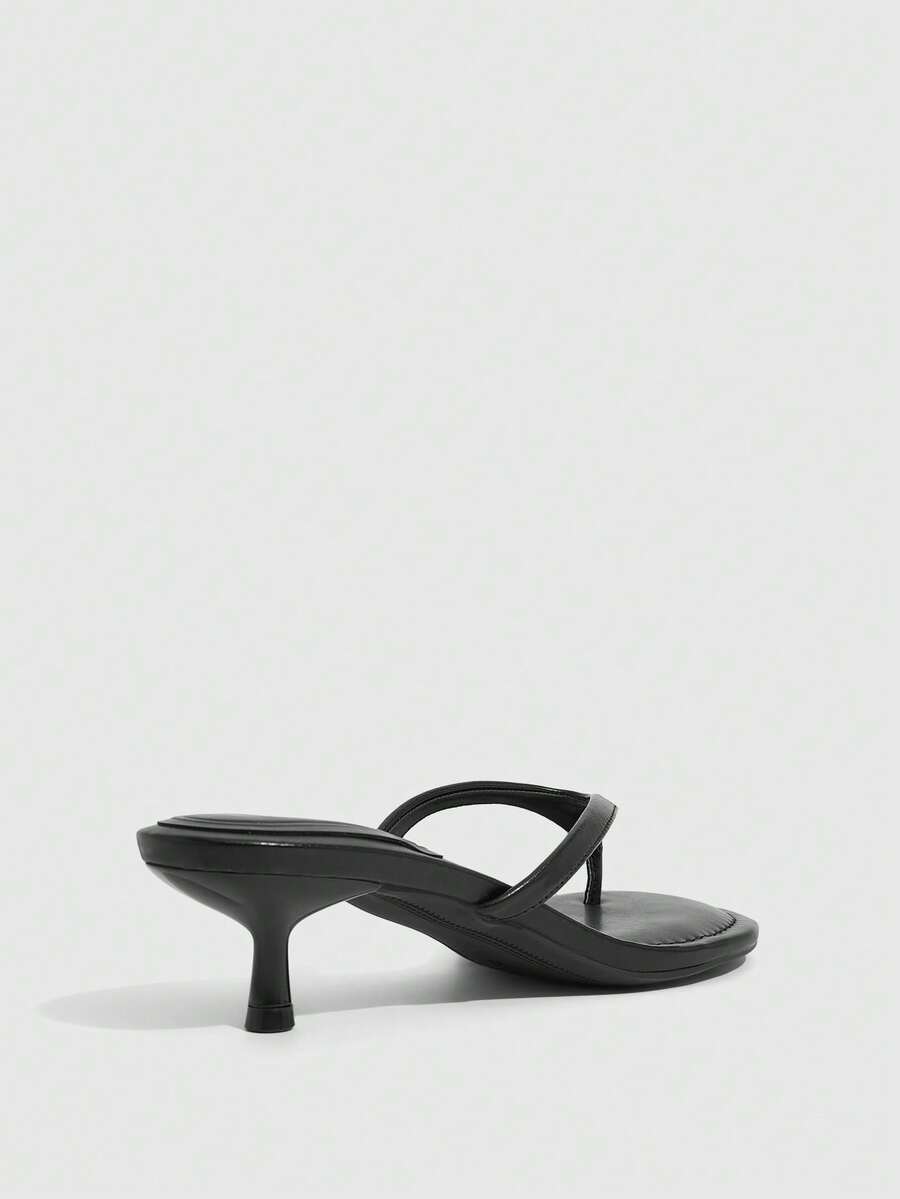 Women's kitten heel flip flop sandals featuring sleek PU leather straps, open toe, and low kitten heel.