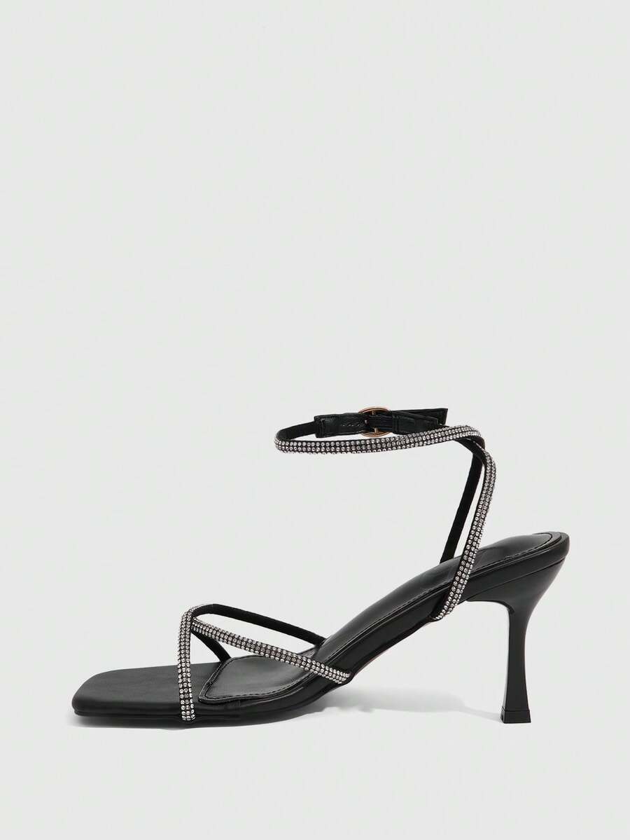 Women's open toe stiletto heel sandals featuring square toe design, criss-cross rhinestone slim straps, and secure ankle strap.