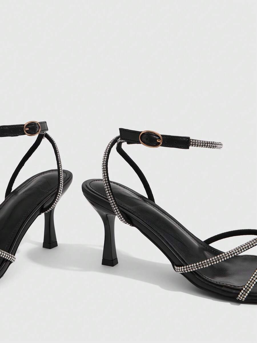 Women's open toe stiletto heel sandals featuring square toe design, criss-cross rhinestone slim straps, and secure ankle strap.