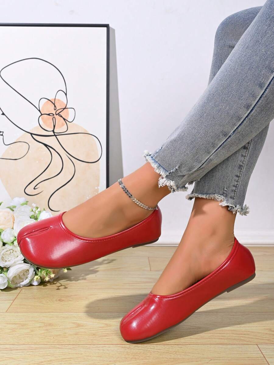 Women's white split-toe slip-on flat shoes with braided accent and rubber sole