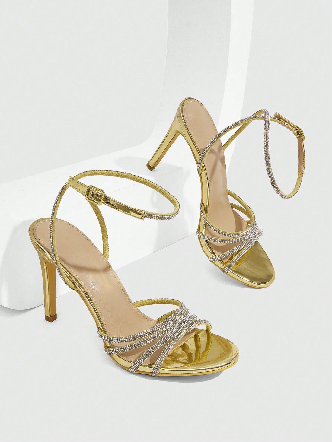 Silver rhinestone stiletto high heel sandals with open toe and adjustable ankle strap buckle
