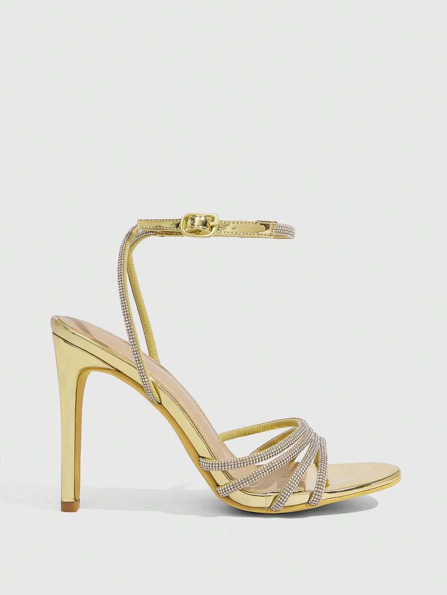 Silver rhinestone stiletto high heel sandals with open toe and adjustable ankle strap buckle