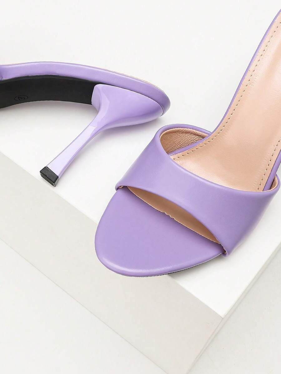 Women's stiletto high heel sandals with an open round toe and slingback strap crafted from smooth PU leather.