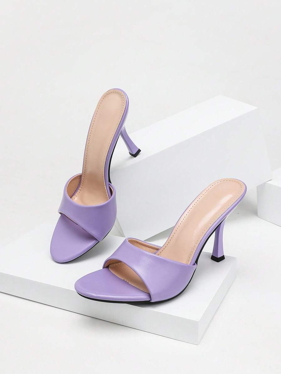 Women's stiletto high heel sandals with an open round toe and slingback strap crafted from smooth PU leather.