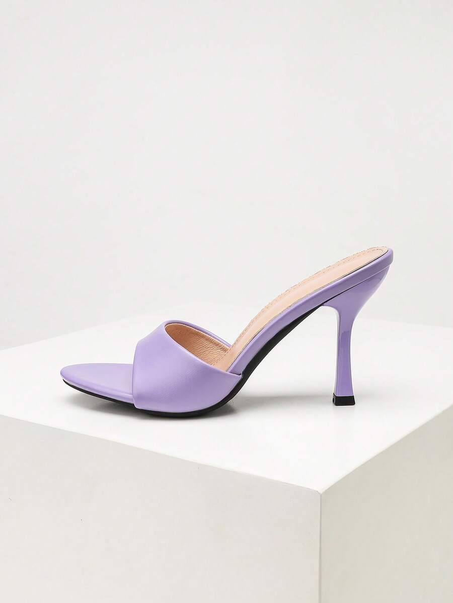 Women's stiletto high heel sandals with an open round toe and slingback strap crafted from smooth PU leather.