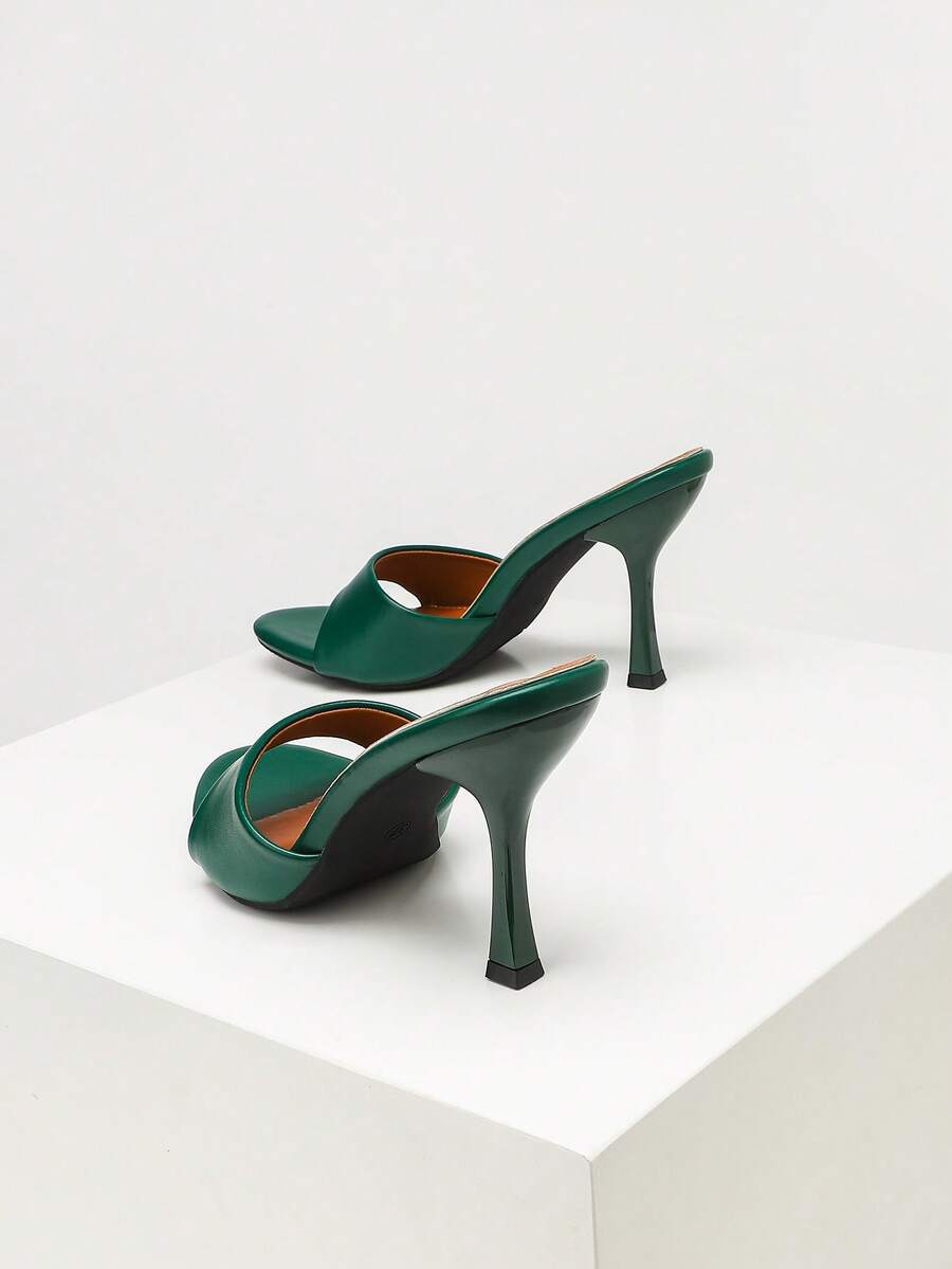 Women's stiletto high heel sandals with an open round toe and slingback strap crafted from smooth PU leather.