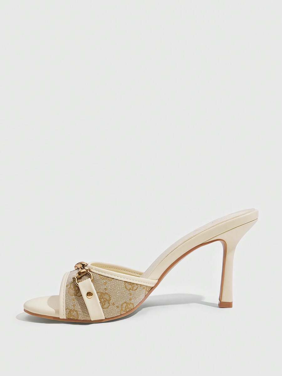 Women's beige high heel mule sandals with open round toe and metal chain detail