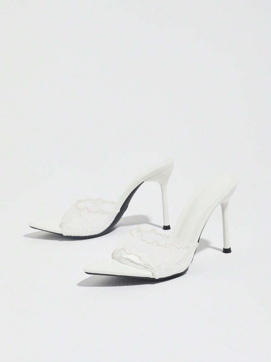 Women's open toe stiletto high heel mule shoes in smooth PU leather with slip-on strap design.