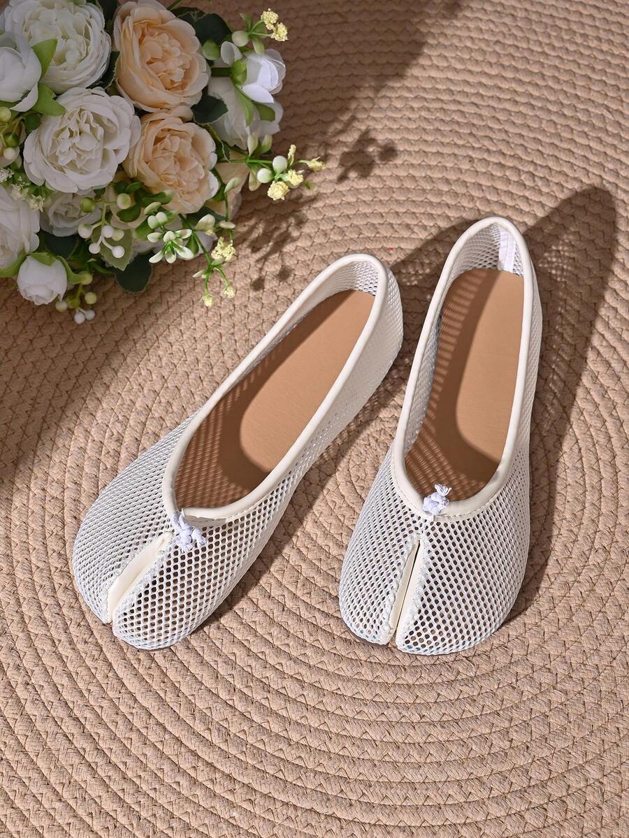 Women's white split-toe slip-on flat shoes with braided accent and rubber sole