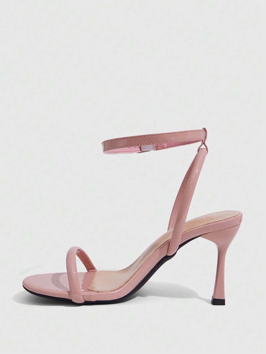 Women's open toe stiletto high heel sandals with an adjustable buckle strap and sleek PU leather finish