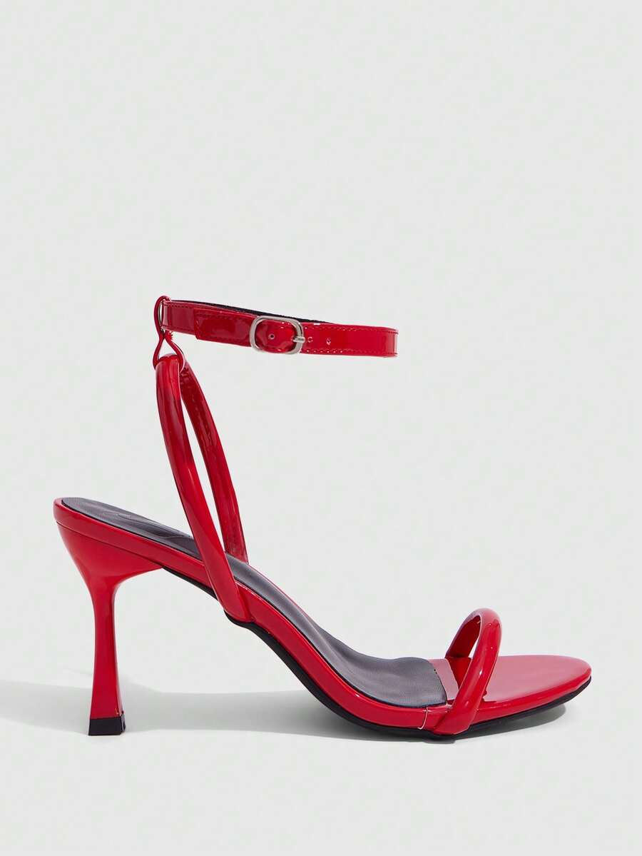 Women's open toe stiletto high heel sandals with an adjustable buckle strap and sleek PU leather finish