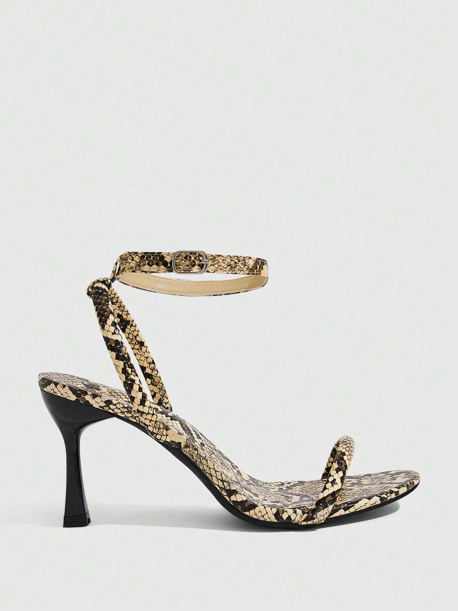 Women's open toe stiletto high heel sandals with an adjustable buckle strap and sleek PU leather finish