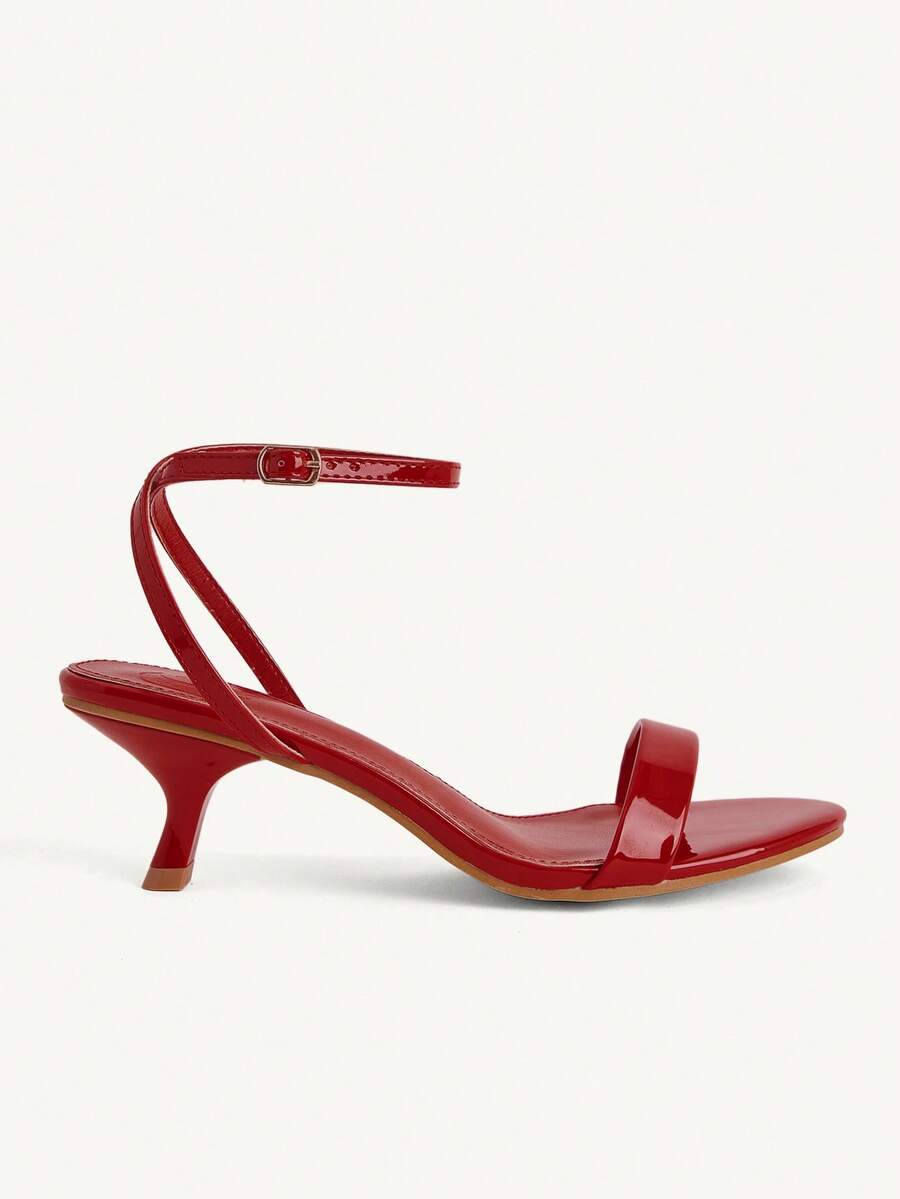 Women's open-toed high-heeled sandals featuring a 5.5cm kitten heel stiletto, sleek ankle strap with buckle closure, and smooth PU leather finish.