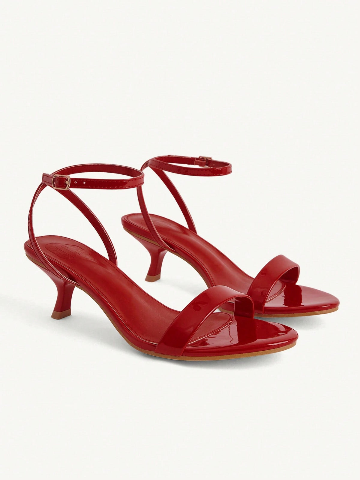 Women's open-toed high-heeled sandals featuring a 5.5cm kitten heel stiletto, sleek ankle strap with buckle closure, and smooth PU leather finish.