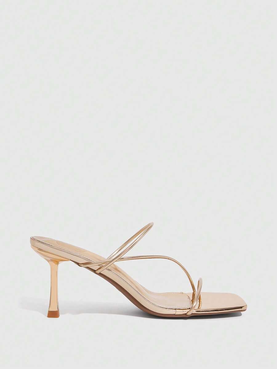 Women's open toe stiletto heel sandals featuring square toe design, criss-cross rhinestone slim straps, and secure ankle strap.