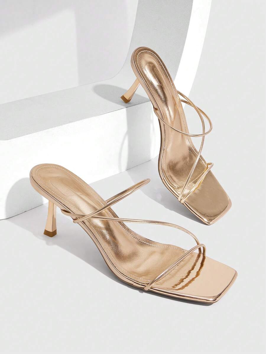 Women's open toe stiletto heel sandals featuring square toe design, criss-cross rhinestone slim straps, and secure ankle strap.