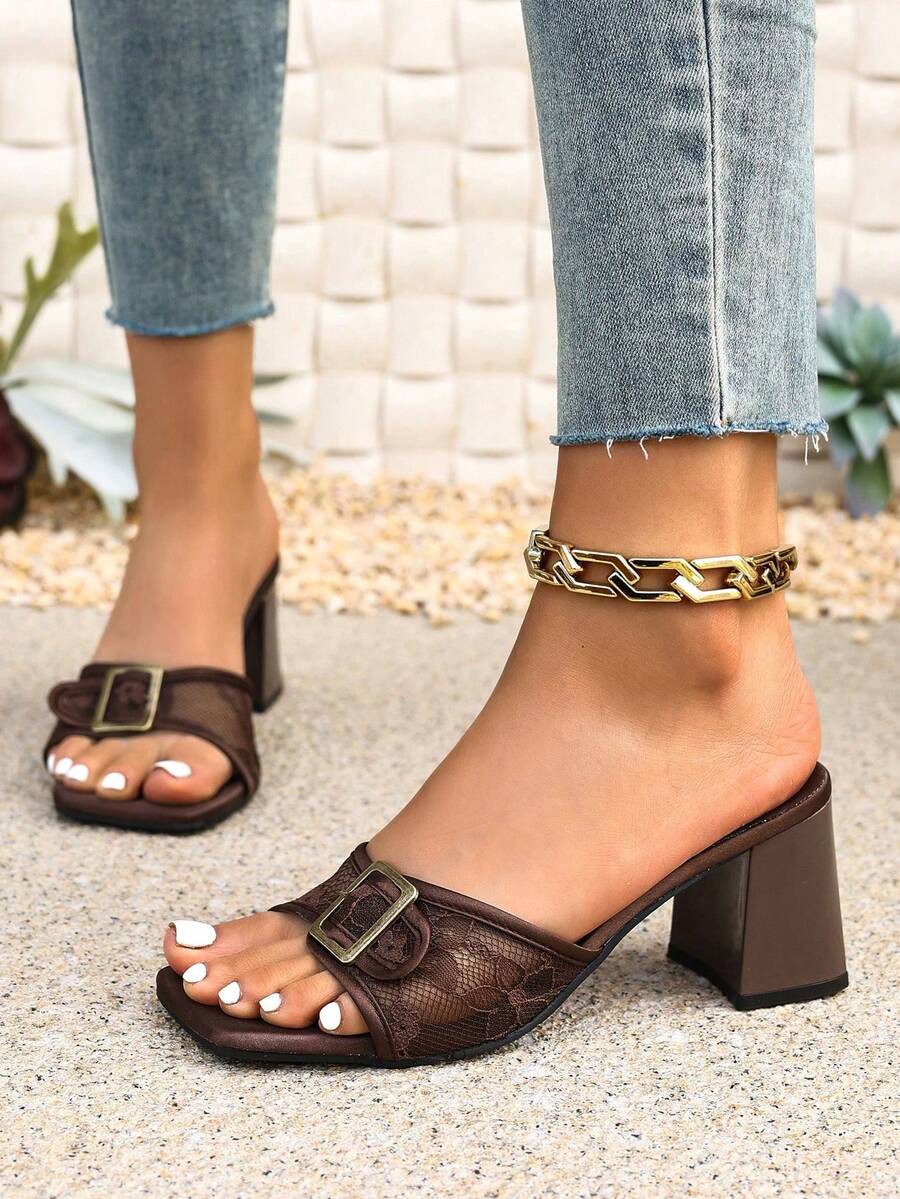Women's open toe stiletto high heel sandals with breathable mesh lining and slip-on design.