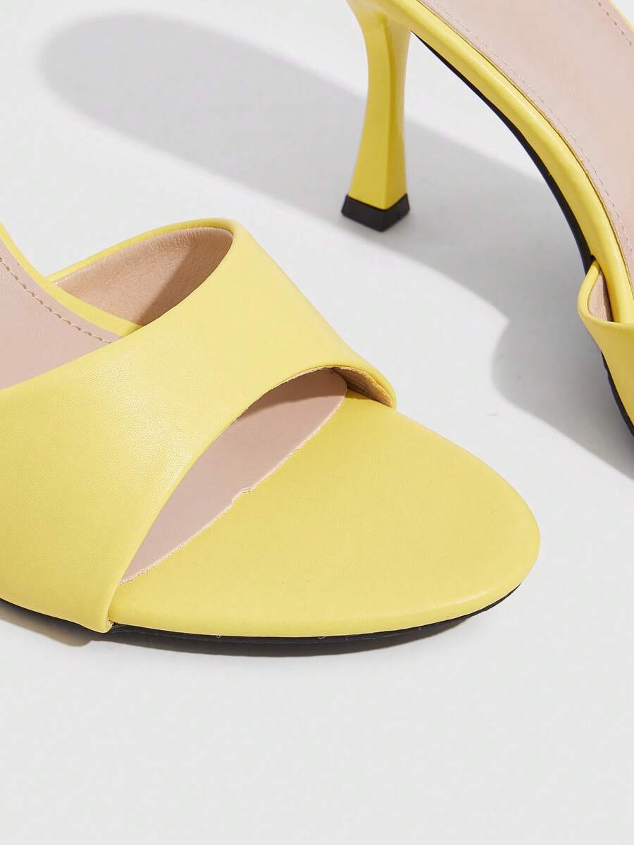 Women's open toe high heel sandals with slingback strap and sleek stiletto heel in smooth PU leather.