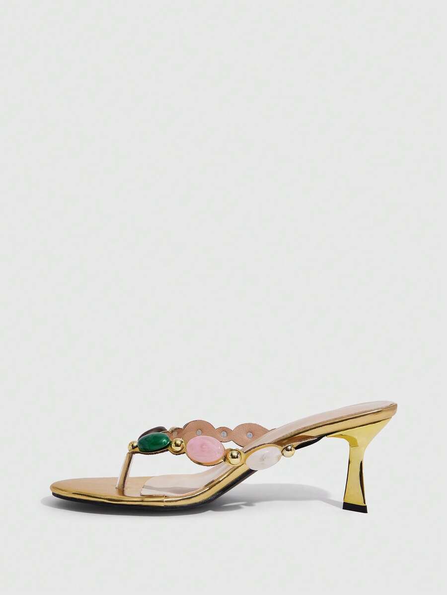 Elegant ladies strappy high-heeled slippers featuring a sleek toe post, buckle accent, and stiletto mid heel in smooth PU leather.