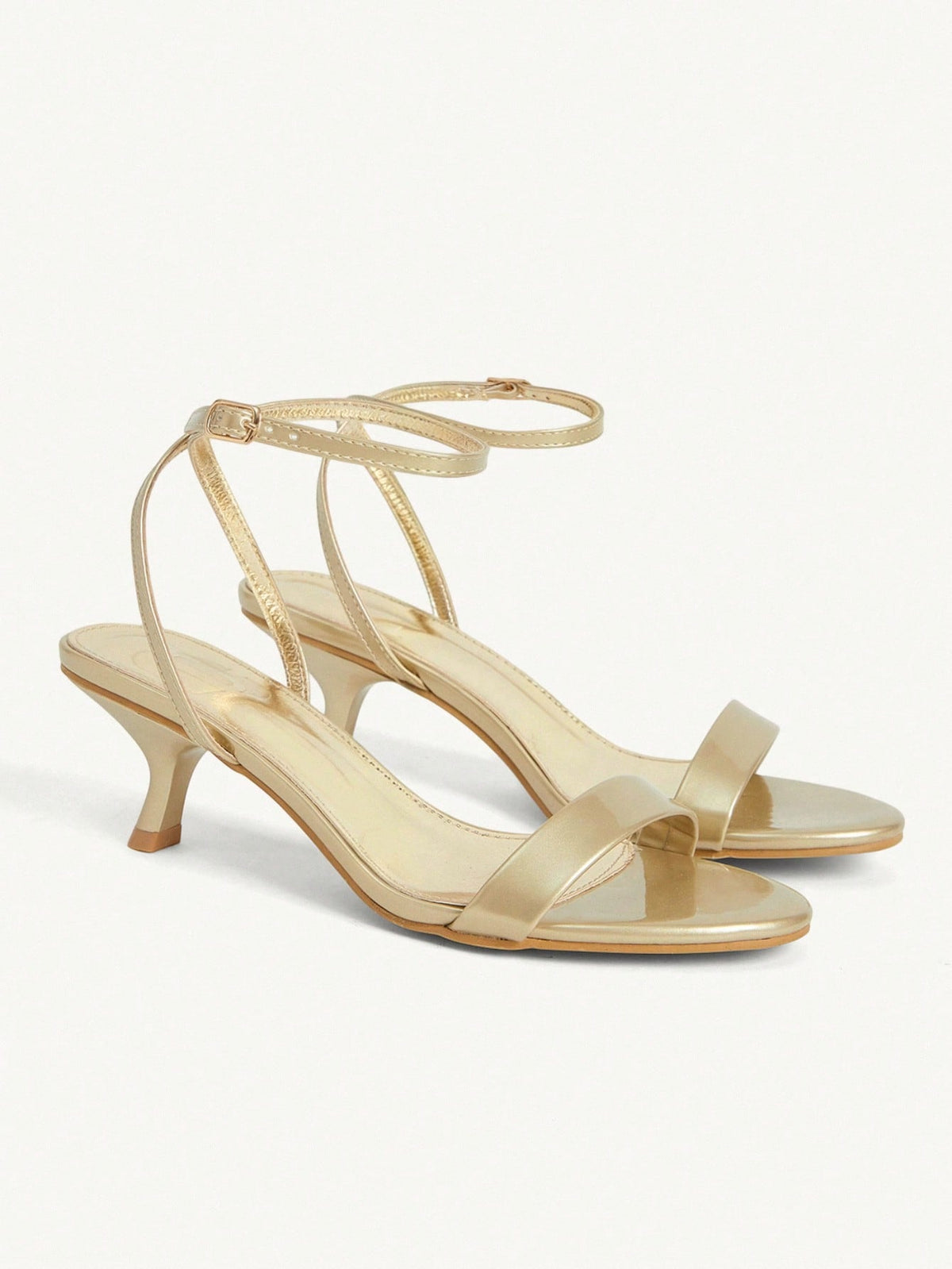 Women's open-toed high-heeled sandals featuring a 5.5cm kitten heel stiletto, sleek ankle strap with buckle closure, and smooth PU leather finish.